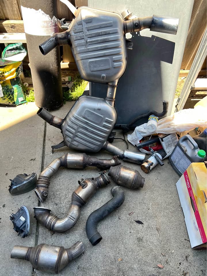 BMW E92 downpipe with catalytic converters, mufflers, charge pipe, fog light housing
