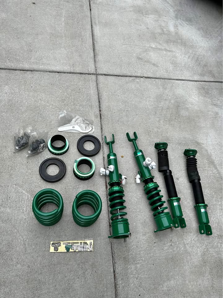 Complete front and rear adjustable suspension for small car.